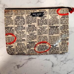Kate Spade news print pouch.